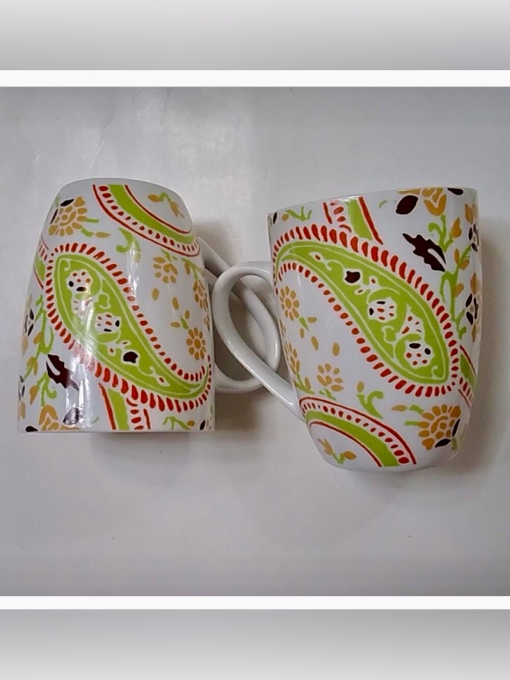 Rachael Ray K014 White Mug Set with Orange and Green Paisley Accents